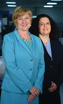 Schindler, right, of nursing education, here with Dr. Smith, helped oversee the education and competency components of the Inform II rollout. “We wanted to have a brand-new user show they can do both a quality check and a patient test,” she says.