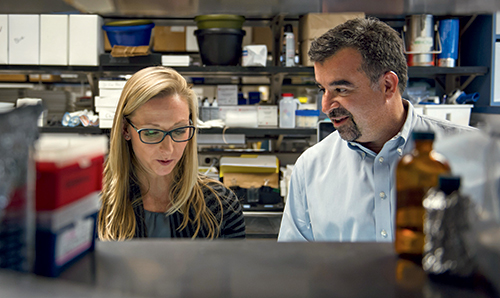 Dr. Thomas Giordano, here with research associate Michelle Vinco, co-led the three-part analysis of 496 papillary thyroid carcinomas. Perhaps the time has come, the study says, to revise the classification of thyroid cancer.