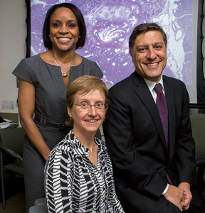 Lead author Dr. Volkan Adsay (right), with coauthors and Emory pathologists Alyssa Krasinskas, MD (front), and Michelle Reid, MD. The new guideline fills a gap in IPMN pathologic evaluation and reporting, says Dr. Adsay. “A lot of pathologists are being exposed to this entity.”