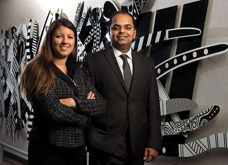 Henry Ford Health System’s Dr. Gaurav Sharma (right) and Jacqueline Copeland use analytics to track, trend, and prevent preanalytic defects. “We’re trying to gather and look at large amounts of data with the aim of converting it into information that leads to action,” Dr. Sharma says.
