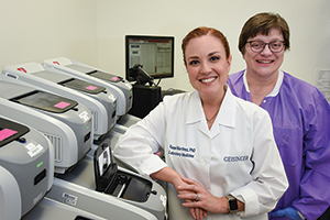 A yearly algorithm, a triage system, and a dashboard keep molecular testing for respiratory pathogens on track at Geisinger. Random-access testing and a reduced TAT are saving the health system millions, says Dr. Martinez (left), here with Barb Heiter, BS, MT(ASCP).