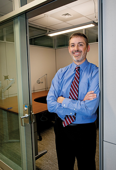 The separate molecular diagnostic laboratories, directed by Dr. Bryan Betz, above, have been co-located. “We have redundancy and cross-coverage to handle equipment breakdowns,” he says.