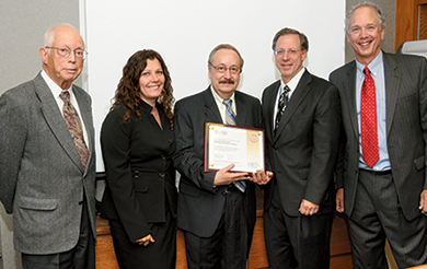 A celebration of 15189 accreditation at HFHS in August.  Above from left, Aaron Lupovitch, MD, director of regulatory quality initiatives; Rita D’Angelo; David Wolfe, CAP 15189 lead assessor; Dr. Richard Zarbo; and Michael Grilliot, manager of CAP 15189 and CAP Biorepository Accreditation. 