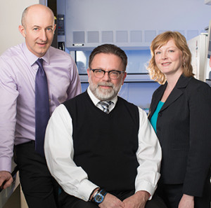 GI and breast pathologists at URMC are working together on gastric HER2 testing. “It’s helpful to have both groups provide reference and be open to help with interpretation,” says Dr. Aram Hezel (left), with Dr. David Hicks and Dr. Christa Whitney-Miller.