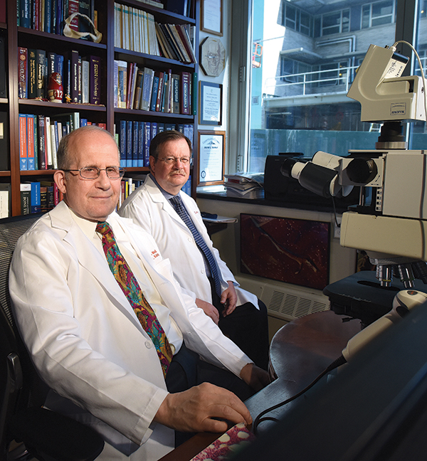 Dr. Michael Klein (left) and Dr. Edward DiCarlo  made a compelling case in 2014 for comparing clinical and histologic diagnoses in patients  undergoing total joint arthroplasties.