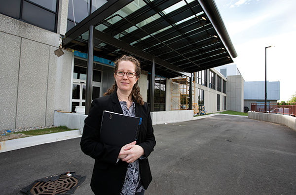 Christine Baker at the specimen delivery entrance to the building. In Lean facility design, she says, space is designed around the ideal process flow.