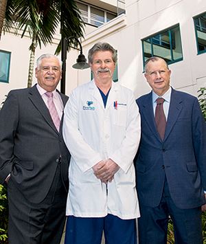Serrano (from left), Dr. Reineke, and Dr. Giffler at Broward Health. Says Serrano: “The lab can’t do the formulary for the doctors. The doctors have to do their own.”