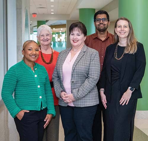 Dr. Beverly Rogers (second from left), former chief of pathology, shown at the hospital with (from left) Drs. Rollins and Carter and Sarah Thompson, along with human factors engineer Swaminathan Kandaswamy, PhD, of Emory University.