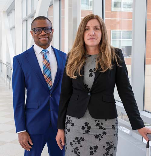 Dr. Frederick Korley and Dr. Carmen Gherasim of Michigan Medicine