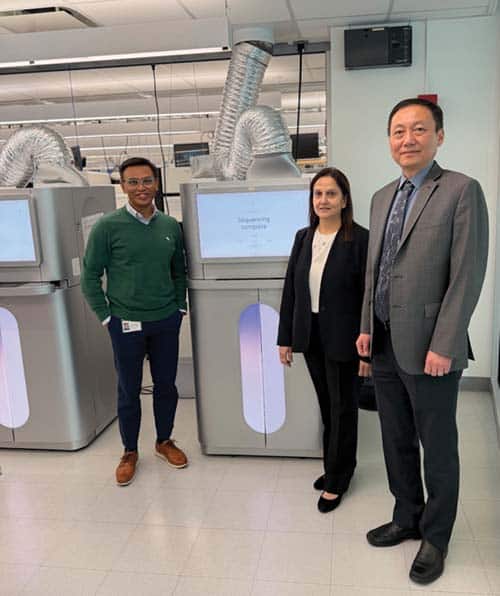 Dr. Jobanputra (second from right) and Dr. Guha (left) seenhere at the New York Genome Center with CEO and scientific director Bing Ren, PhD