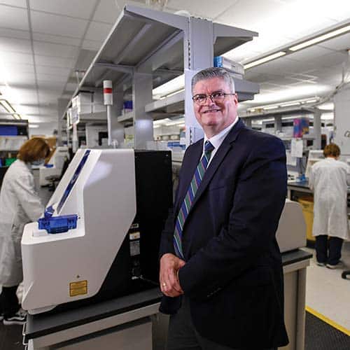 Dr. Terrence Hallahan in the prenatal screening laboratory at Northwell Health Laboratories